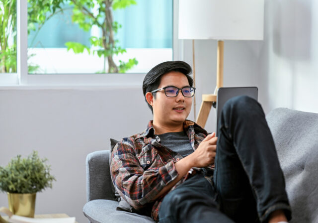 Person browsing the internet with tablet