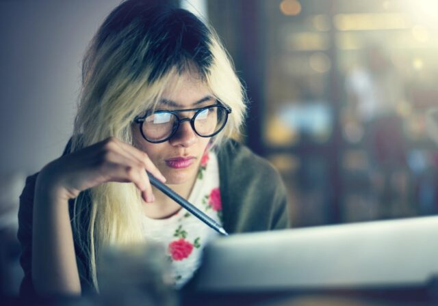 Person browsing the internet on their laptop